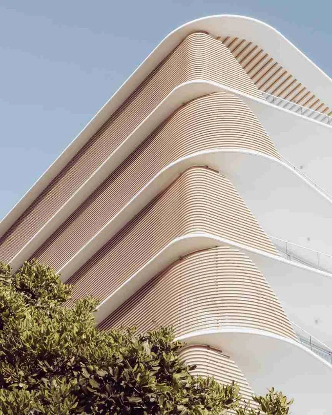 The curved white facade of Feenix Norfolk