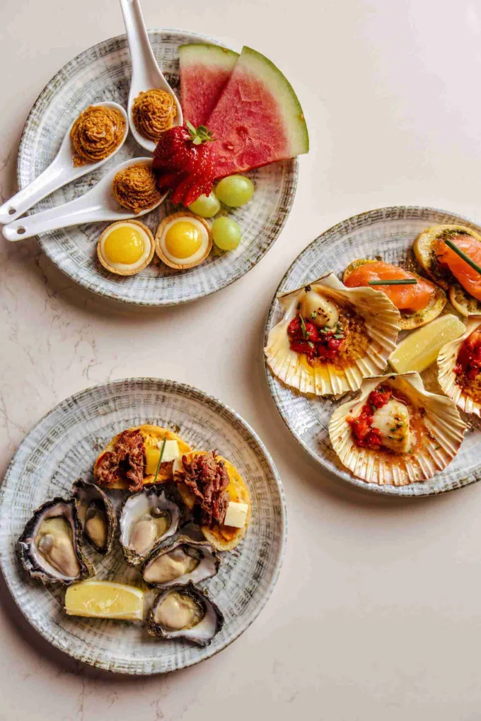 Oysters and seafood, plated and styled